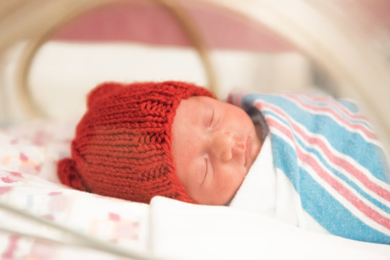 Many babies born in February are receiving red caps as part of the “Little Hats, Big Hearts” project, which draws attention to heart disease.