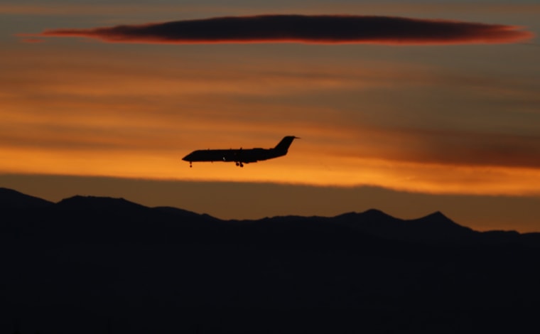 Image: Airplane lands at Denver International Airport