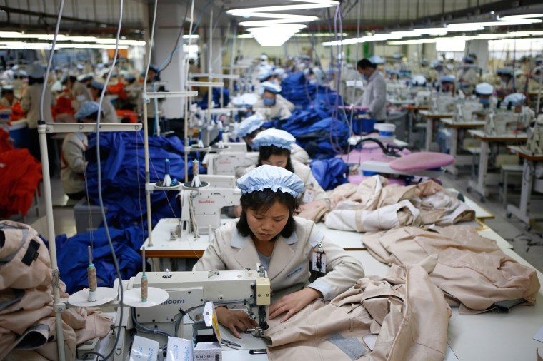 Image: North Korean employees working at a factory of a South Korean-owned company