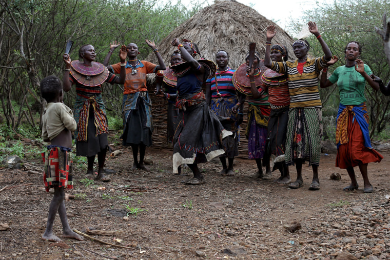 Image: Pokot women dance in celebration the day before an initiation ceremony