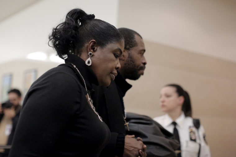 Image: Sylvia Palmer, mother of Akai Gurley, is led from the court room at the Brooklyn Supreme court in the Brooklyn borough of New York
