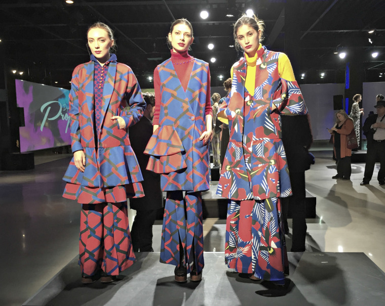 Models pose wearing LENERD at the Epson Digital Couture Fashion presentation during New York Fashion Week Women's Fall/Winter 2016 on February 9, 2016 in New York City.