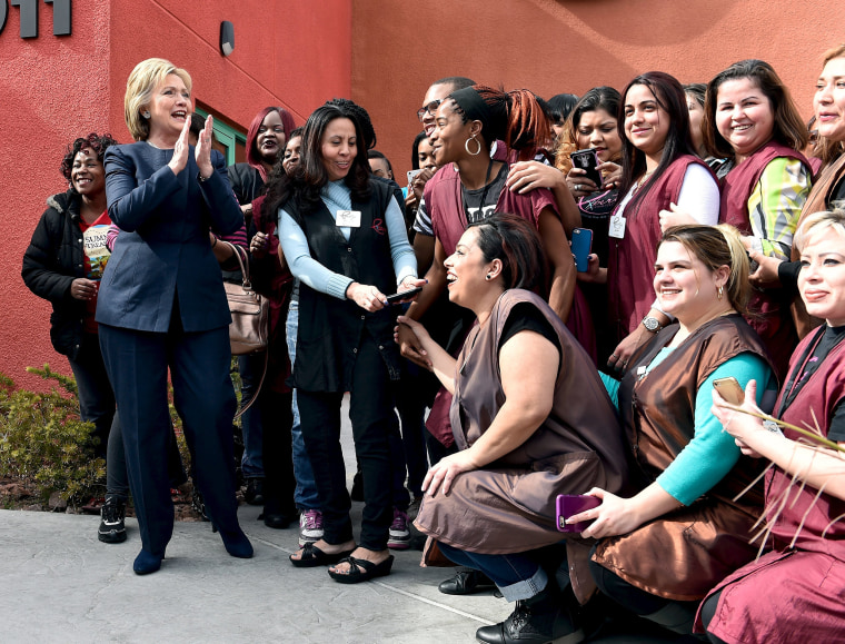 Image: Democratic presidential candidate Hillary Clinton greets students from a beauty school in Las Vegas