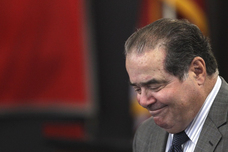 Image: Scalia speaks during a ceremony naming a courtroom