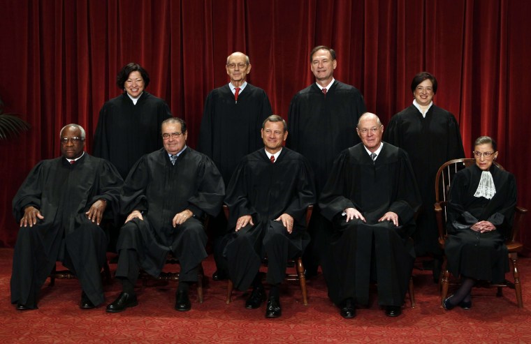Image: Justices of the U.S. Supreme Court pose for formal group photo in the East Conference Room in Washington