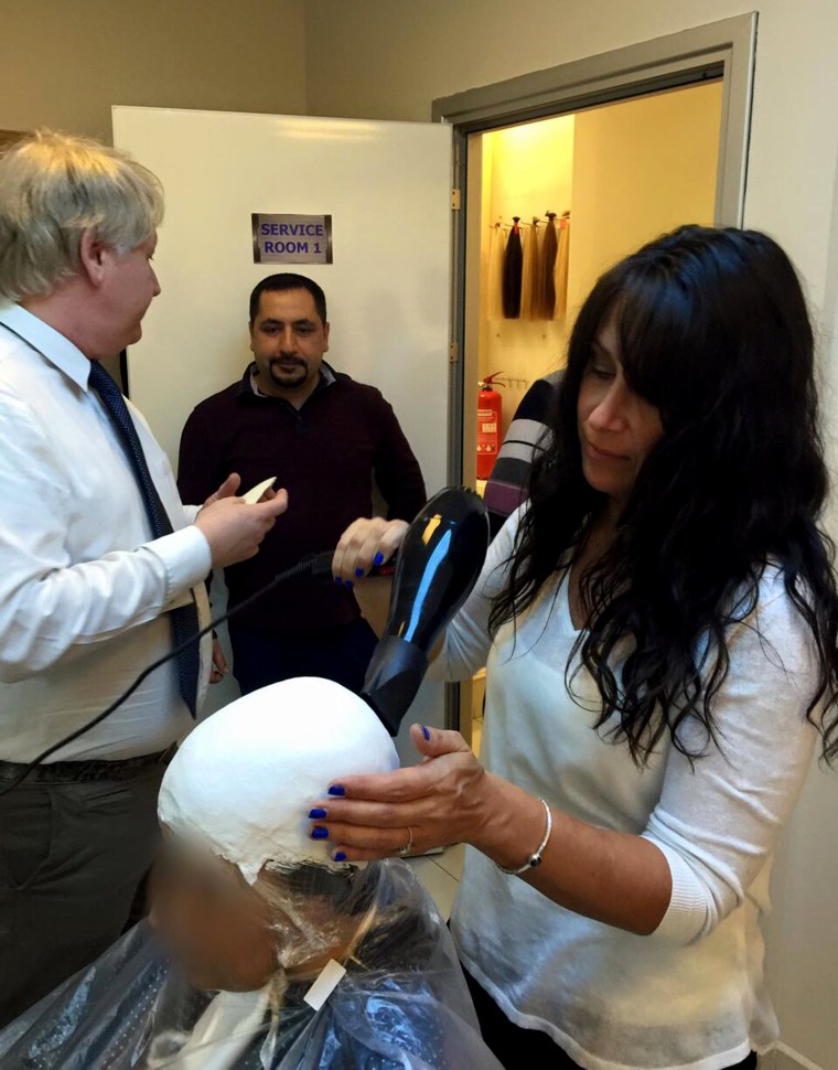 Transitions Hair Solutions owner Danielle Grillo makes a mold during a training in Europe.