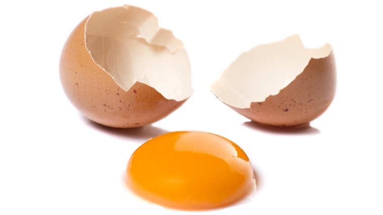 One cracked egg with yolk isolated; Shutterstock ID 183027566; PO: today.com