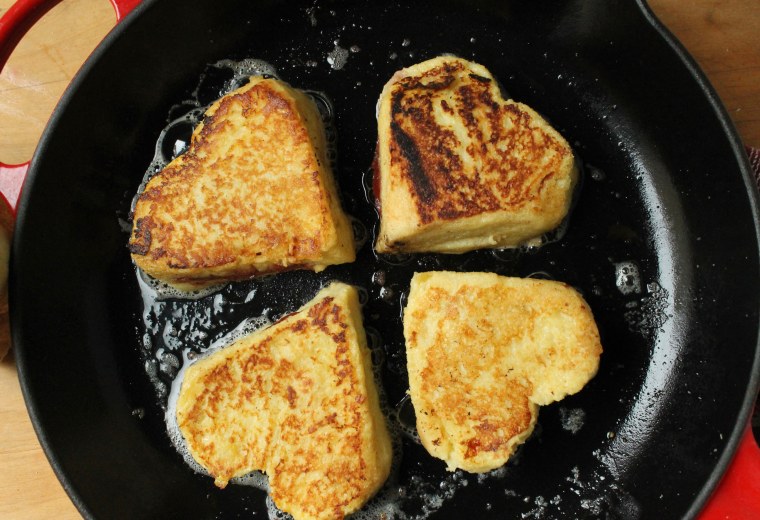 Strawberry and Cream Stuffed French Toast: Cook in melted butter until browned