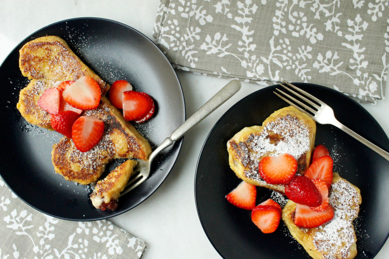 Strawberry and Cream Stuffed French Toast: Top with confectioners' sugar and macerated strawberries