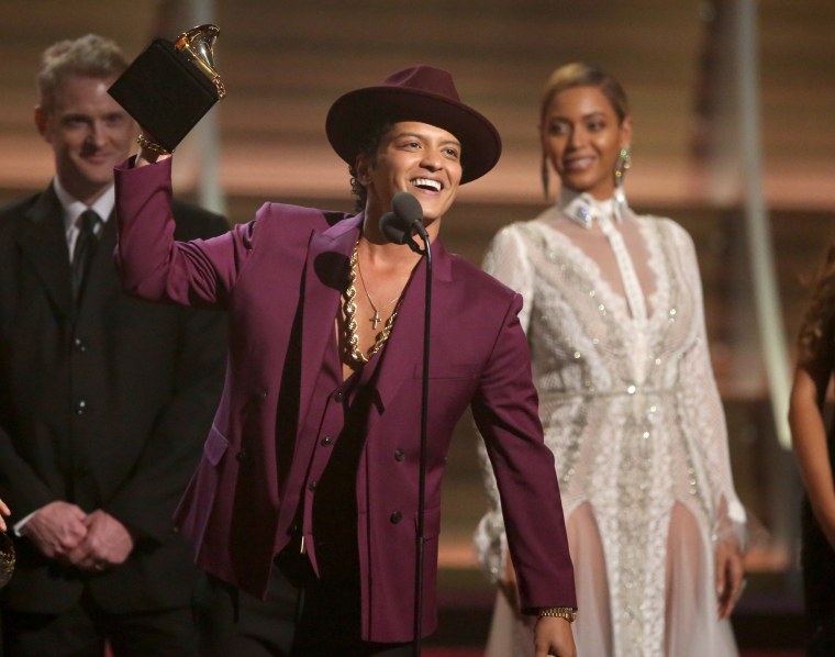 Image: Bruno Mars accept the award for record of the year