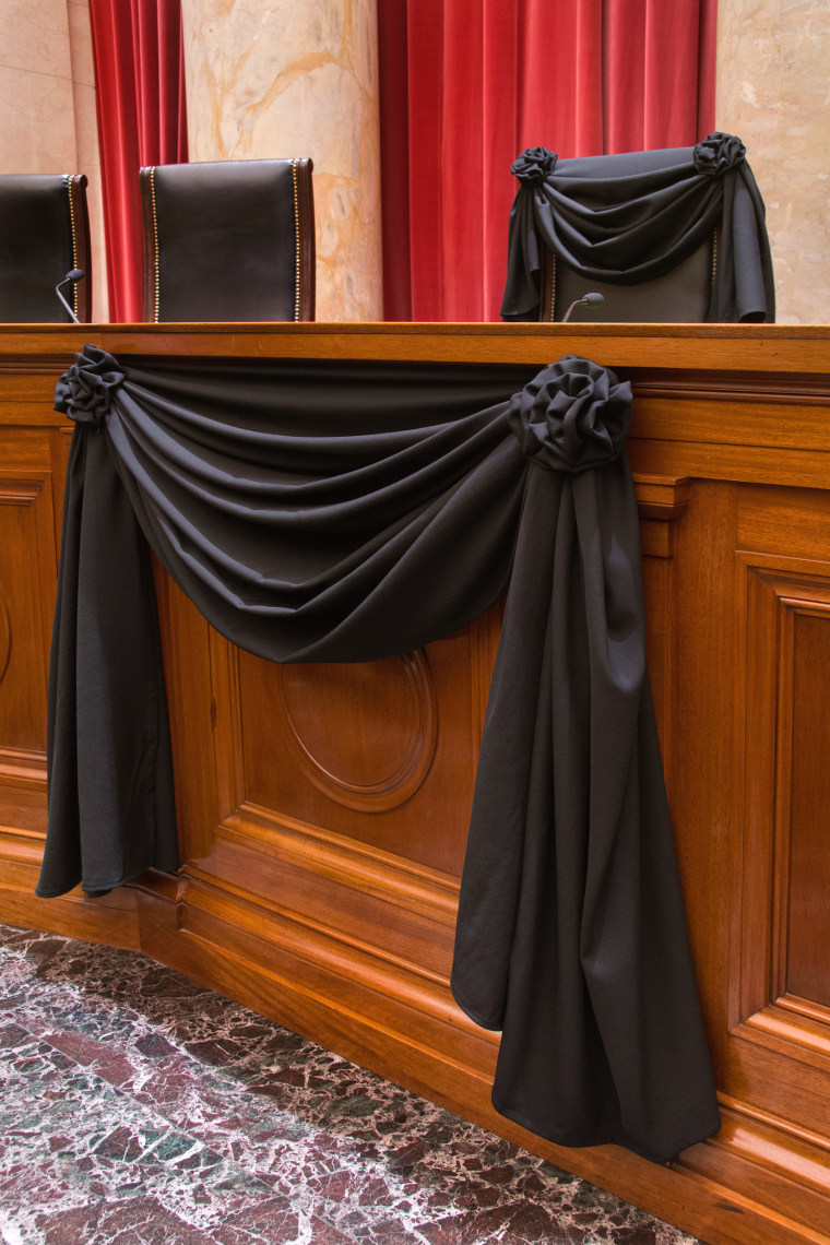 Image: Supreme Court Associate Justice Antonin Scalia’s Bench Chair and the Bench in front of his seat draped in black following his death on Feb.13, 2016.
