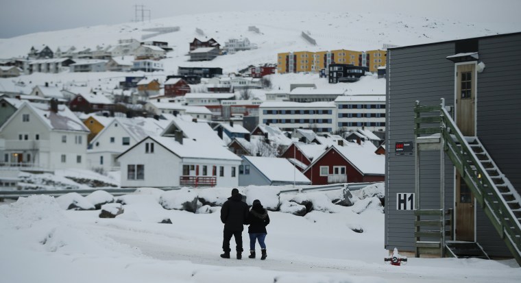 Image: Asylum seekers leave the refugee camp in Hammerfest, Norway
