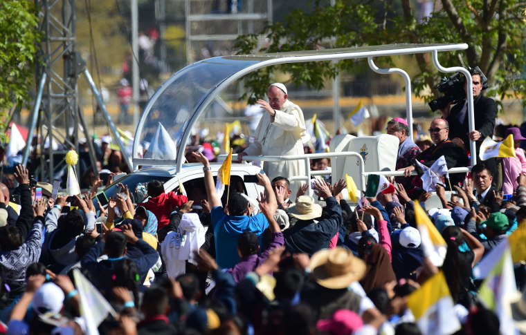 Image: Pope Francis waves at the crowd upon arriving in Ciudad Juarez