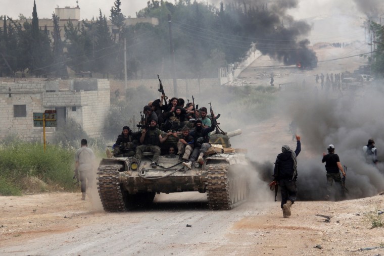 Image: Fighters from a coalition of Islamist forces in Syria