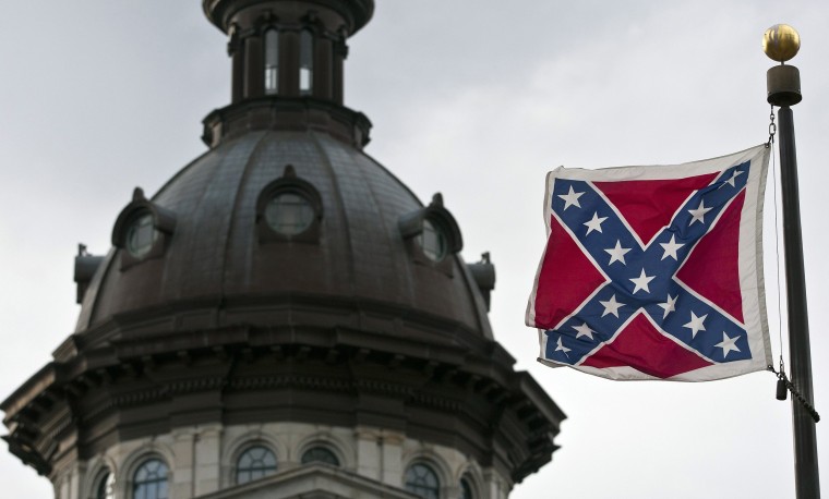 Image: File photo of the Confederate flag flying outside the South Carolina State House in Columbia