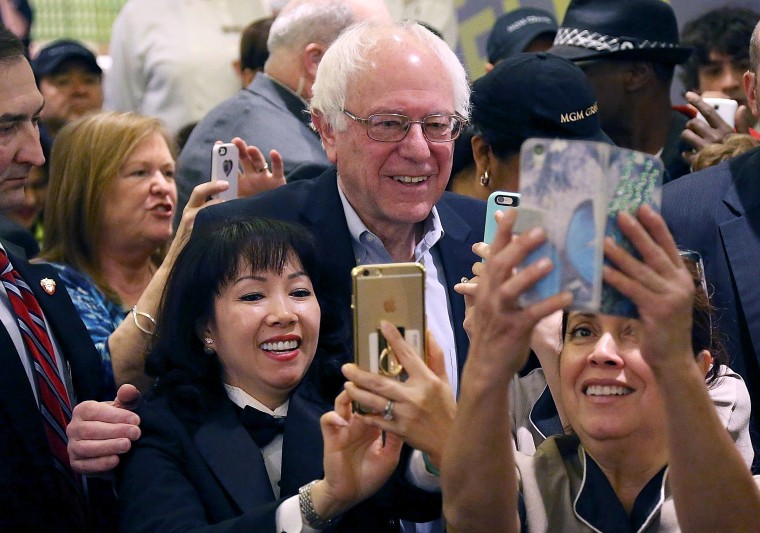 Image: Sanders greets workers in the cafeteria of the MGM Grand Casino