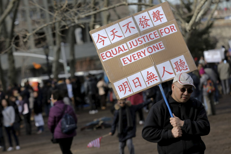 Image: Protesters hold a rally in support of former NYPD officer Peter Liang in Brooklyn