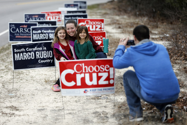 Image: A family take pictures after voting in the South Carolina Republican presidential primary