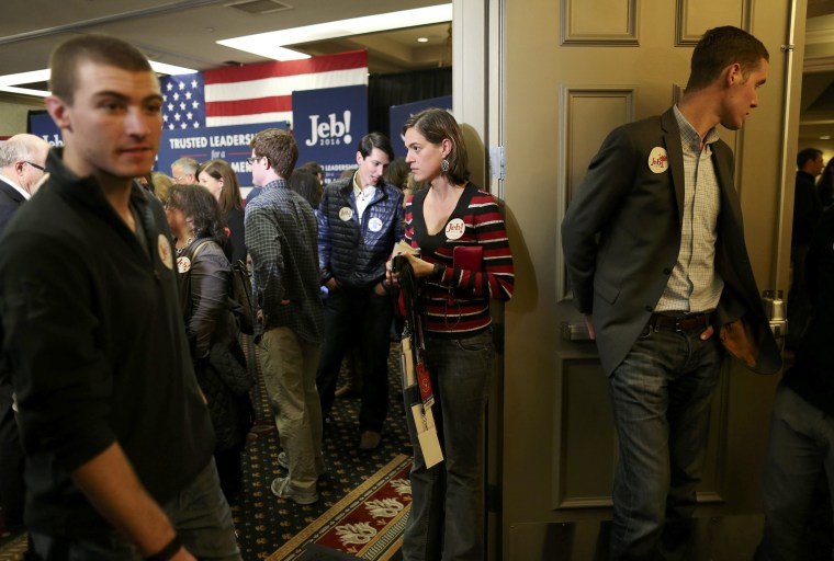 Image: Supporters of Republican presidential candidate Jeb Bush leave the room after Bush abandoned his quest for the White House and suspended his presidential campaign at his South Carolina primary night party in Columbia