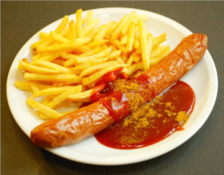 Image: An original Volkswagen Currywurst with fries.