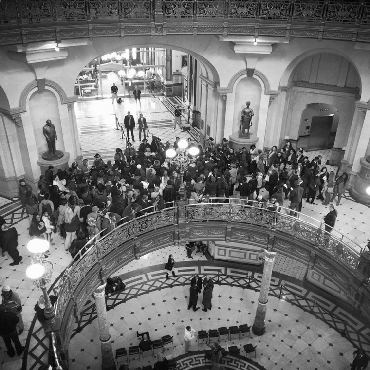 Chicago State University students rally inside the Illinois Statehouse on Wednesday, February 17.