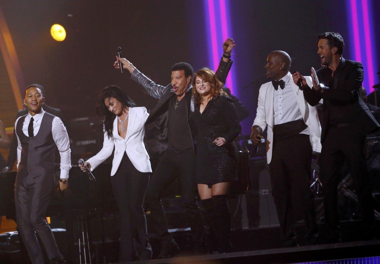 Image: Recording Academy Person of the Year Richie performs "All Night Long" with Legend, Lovato, Trainor, Tyrese and Bryan at the 58th Grammy Awards in Los Angeles