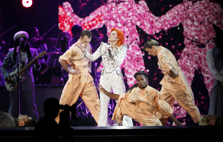 Image: Lady Gaga performs a medley of David Bowie songs as a tribute to the late singer during the 58th Grammy Awards in Los Angeles