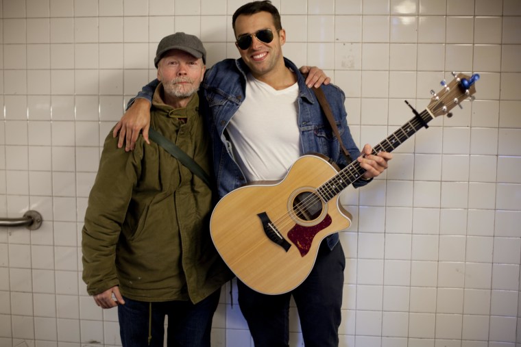 Chris Leamy plays music for the homeless