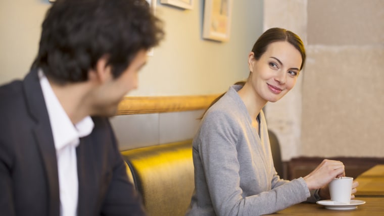Cute Woman flirting with a man In Bar, restaurant; Shutterstock ID 180326066; PO: today.com