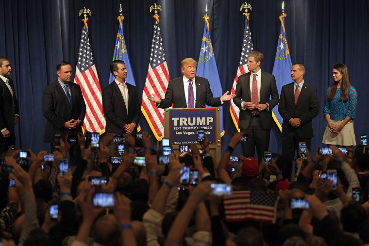 Image: Donald Trump, surrounded by his family, declares victory