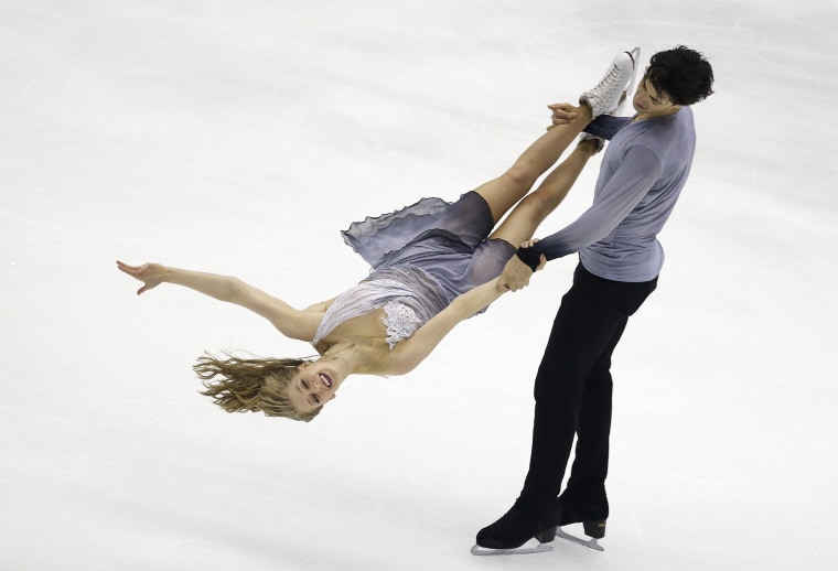 Image: Kaitlyn Weaver and Andrew Poje from Canada perform in the Ice Dance Free Dance program