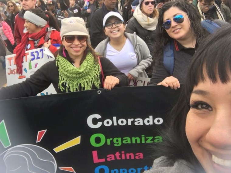 Picture taken with the COLOR staff, board, program participants and volunteers who were marching as part of this year's annual MLK Day "Marade."