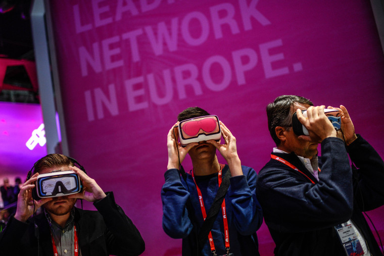 Image: Visitors use Oculus VR virtual reality devices