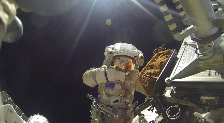 Image: International Space Station crew member Volkov performs spacewalk outside ISS