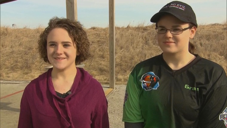 Emma (left) and Grace (right) Hood, 13 and 16 respectively, speaking at a gun range in Iowa on Thursday, Feb. 25th.