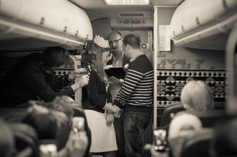 Kristy Stratton and Jim Larsen during their midflight wedding