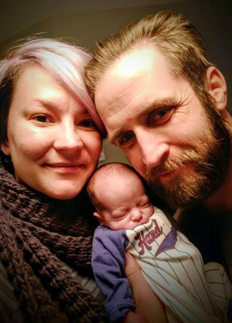 Jessica Collinson and Micheal Burritt with their son Hugo.