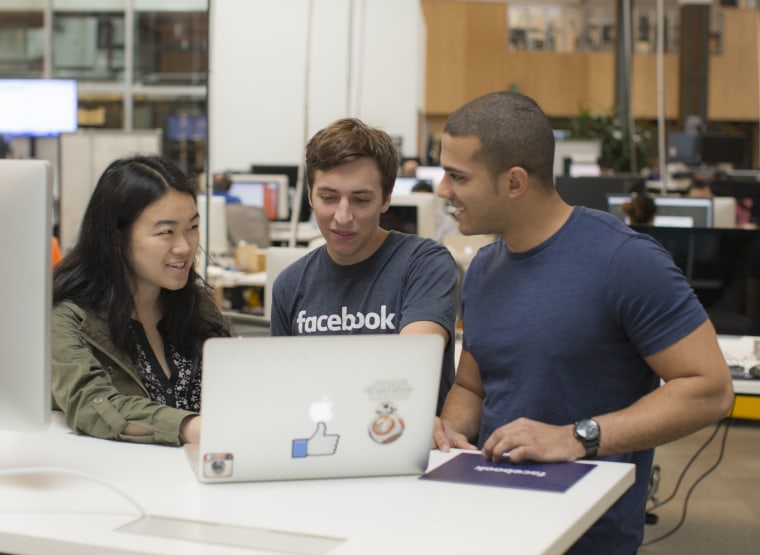 A group of Facebook interns collaborate on a team project