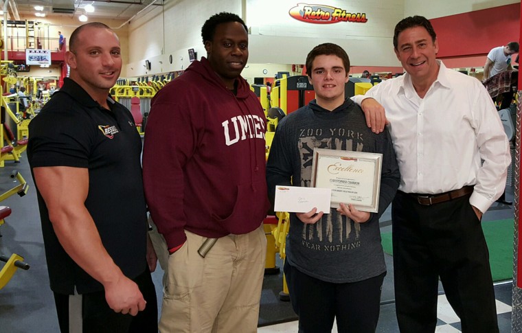 From left to right,Tom DeFelice, Earl Wallace, Chris Charron, and Mitch Kurtzer. Thanks to Wallace's help, Charron lost 325 pounds in two years.