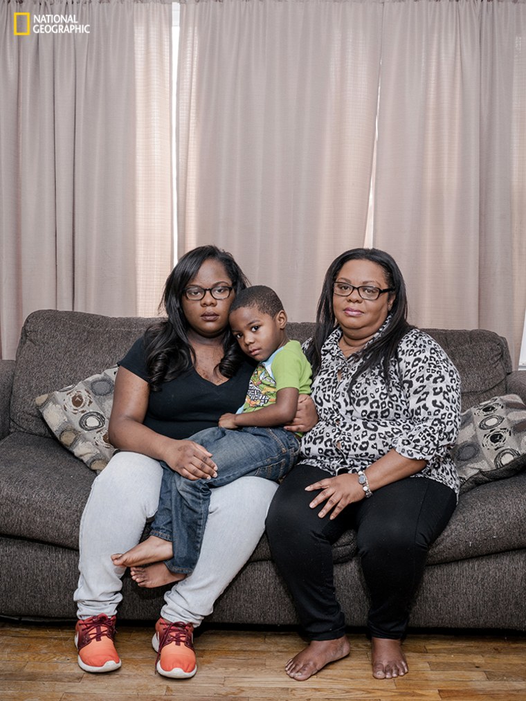 Keonna Miles poses with her mother Antionette Miles and nephew Kirk at their home in Flint on Jan. 30.