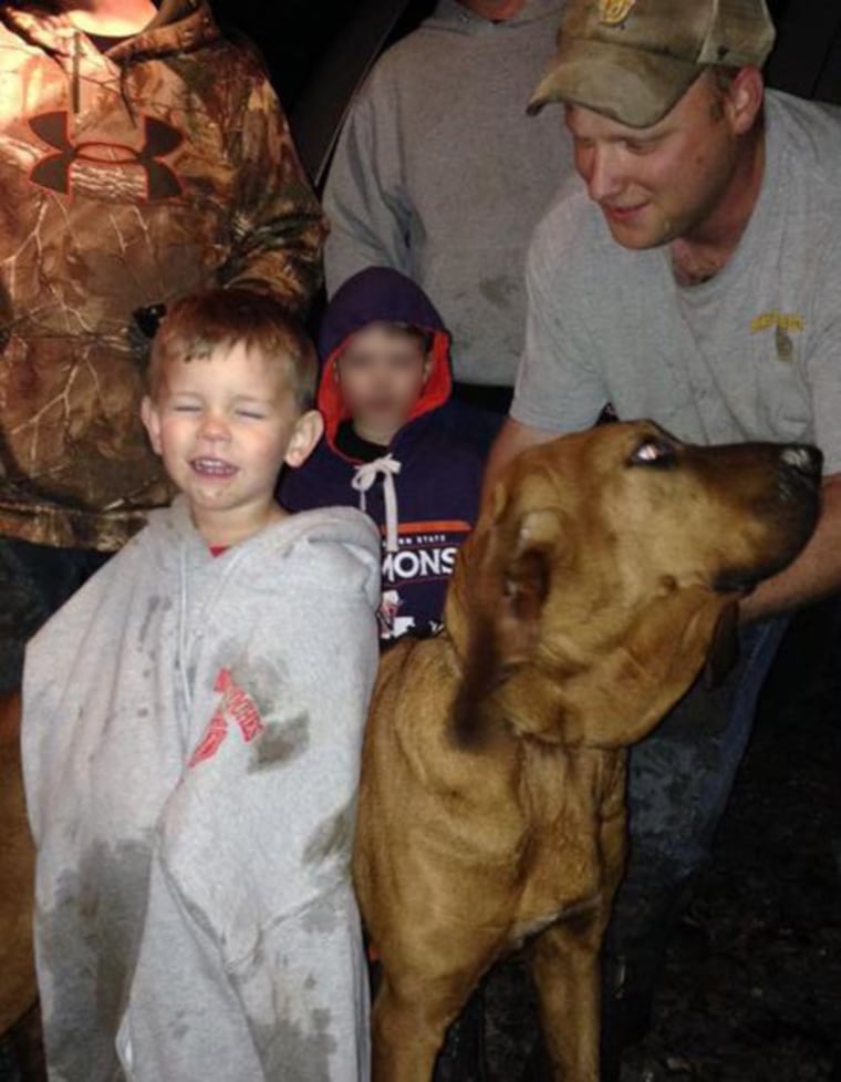 Doug Downs, his dog Honey, and three-year-old Eli.