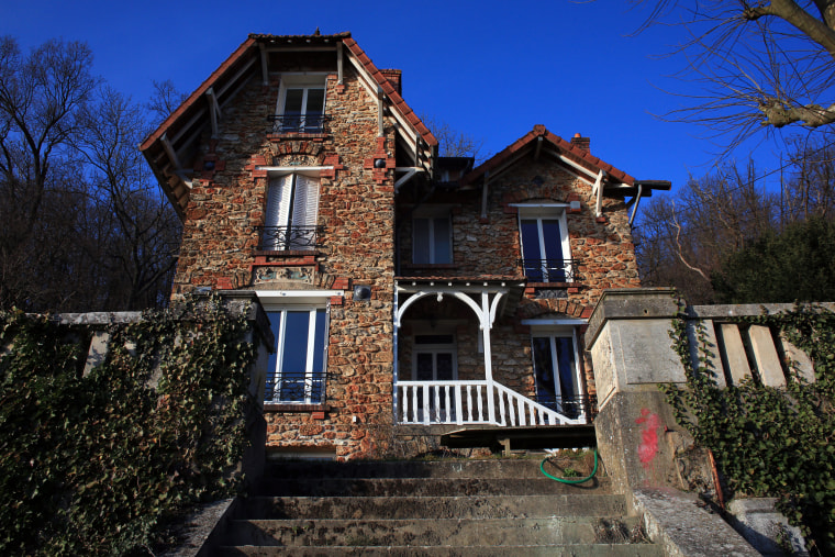The Airbnb rental property where a decomposing body of a woman was found in the garden, in Palaiseau, south of Paris, France, Monday, Feb. 29, 2016.