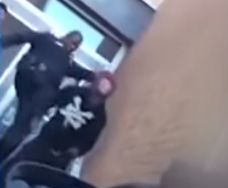 Image: A video surfaces that allegedly shows a Baltimore City Schools Police Department officer slapping and kicking a young man