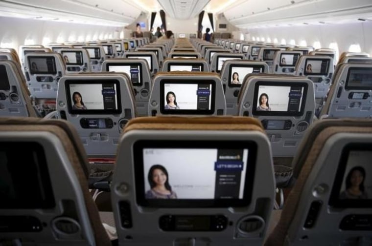 A view of the inflight entertainment screen on the back of economy class seats on the first of 67 new Airbus A350-900 planes delivered to Singapore Airlines at Singapore's Changi Airport