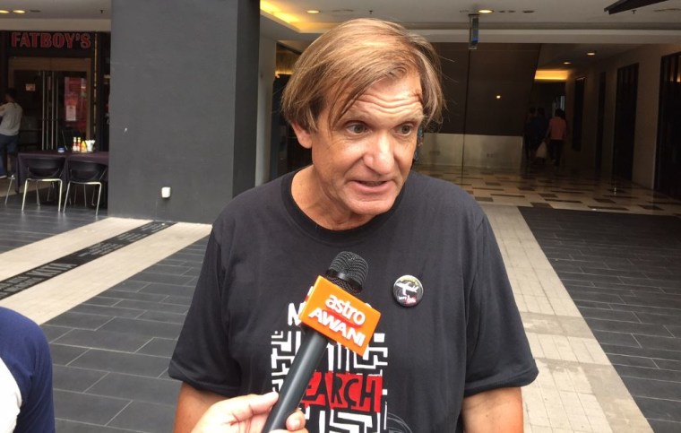 Image: Blaine Gibson speaks to the media in Kuala Lumpur