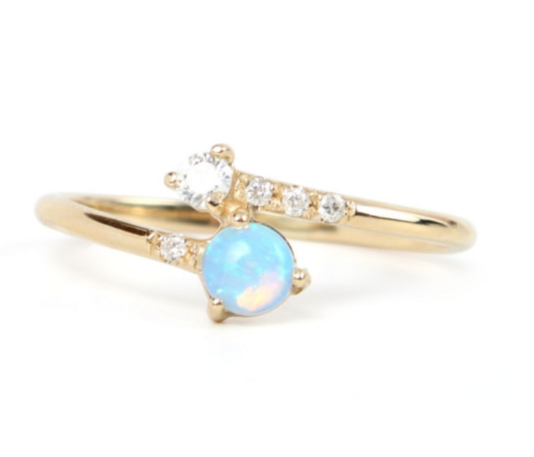 Wwake opal and diamond crossover ring