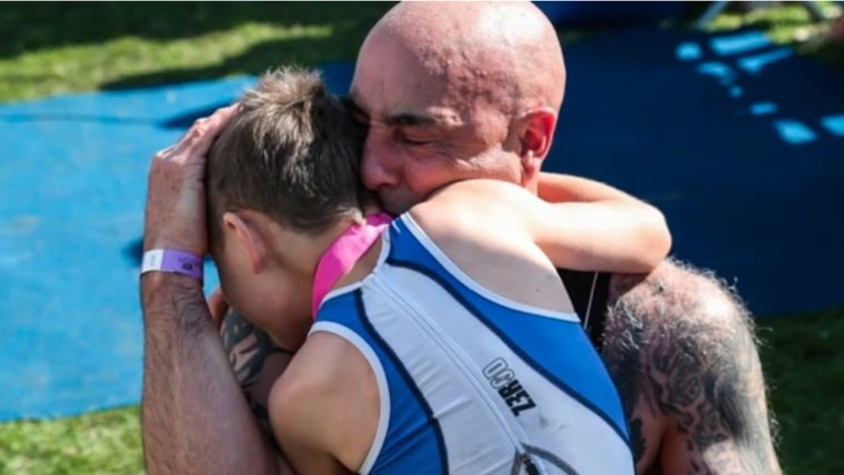 Bailey and his dad hugging after the Castle Howard event.