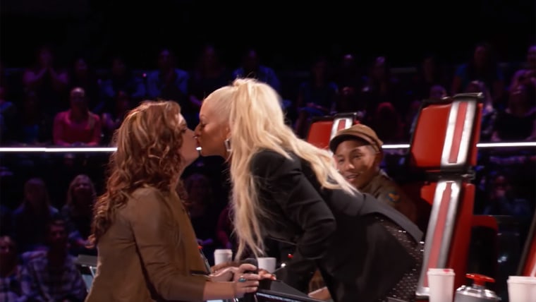 Christina Aguilera kisses contestant