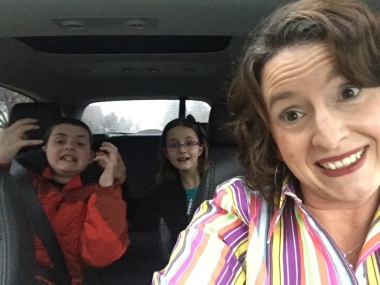 Mom Christine Burke in car with her kids