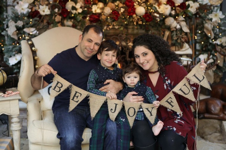 Gader Ibrahim, right, poses with her husband Zaki and her sons Vincent and Jacob. Ibrahim, who lives in Orange County, California, founded Operation Refugee Child.